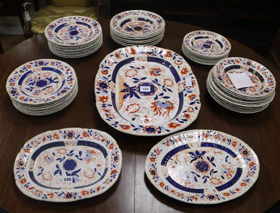 An Ashworths Imari pattern ironstone part dinner service